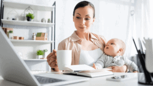 Picture of a woman with a toddler working from home