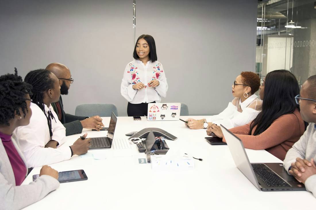 Admissions committee reviewing candidate scorecards together