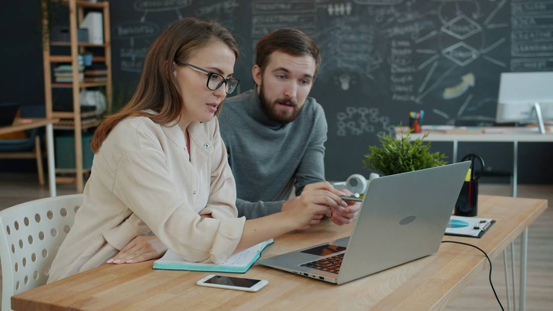 University staff reviewing privacy and compliance documentation
