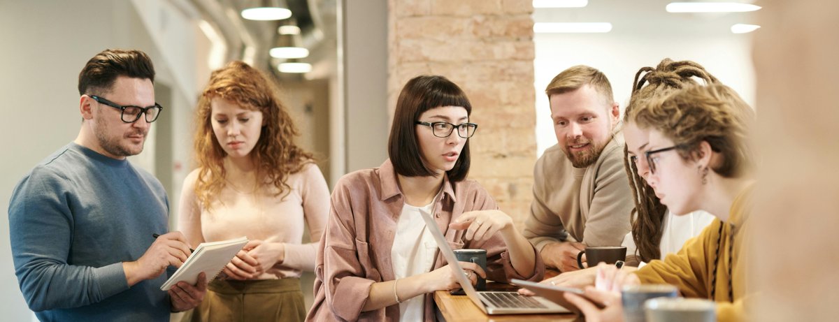 Contact centre agents at their desks wearing headsets